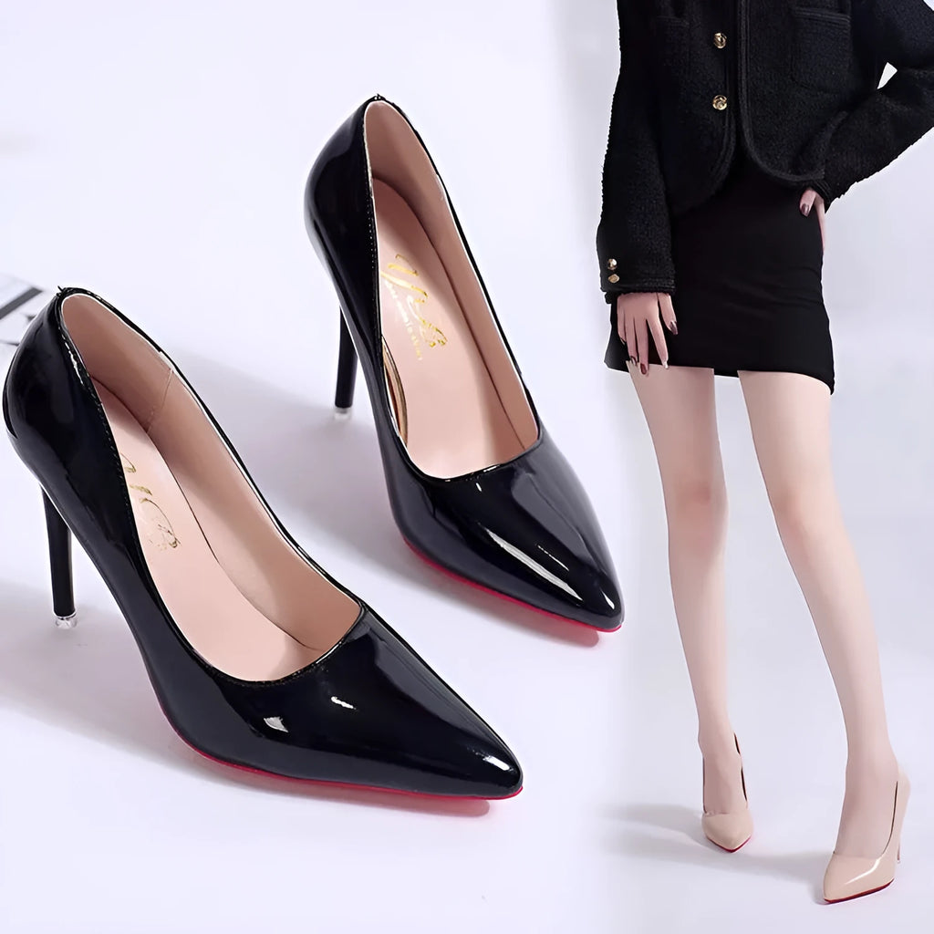 Women's black stiletto heel pointed toe pumps with a shallow mouth on a white background.