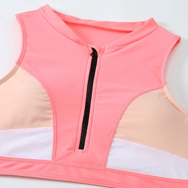 Solid pink women's high waist split bikini swimsuit set on a white background.