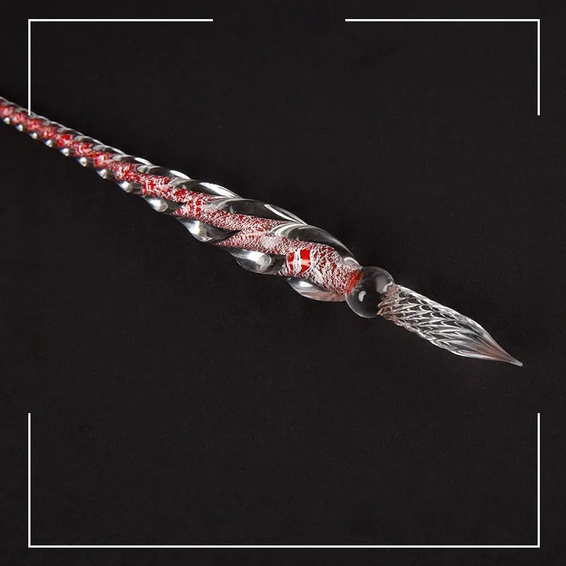 Transparent glass crystal pen with coloured ink visible inside, abstract modelling design