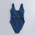 Navy blue women's one-piece slim swimsuit with triangle design and chest pad