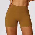 Women's high waist yoga shorts in nylon fabric for fitness and belly contouring.