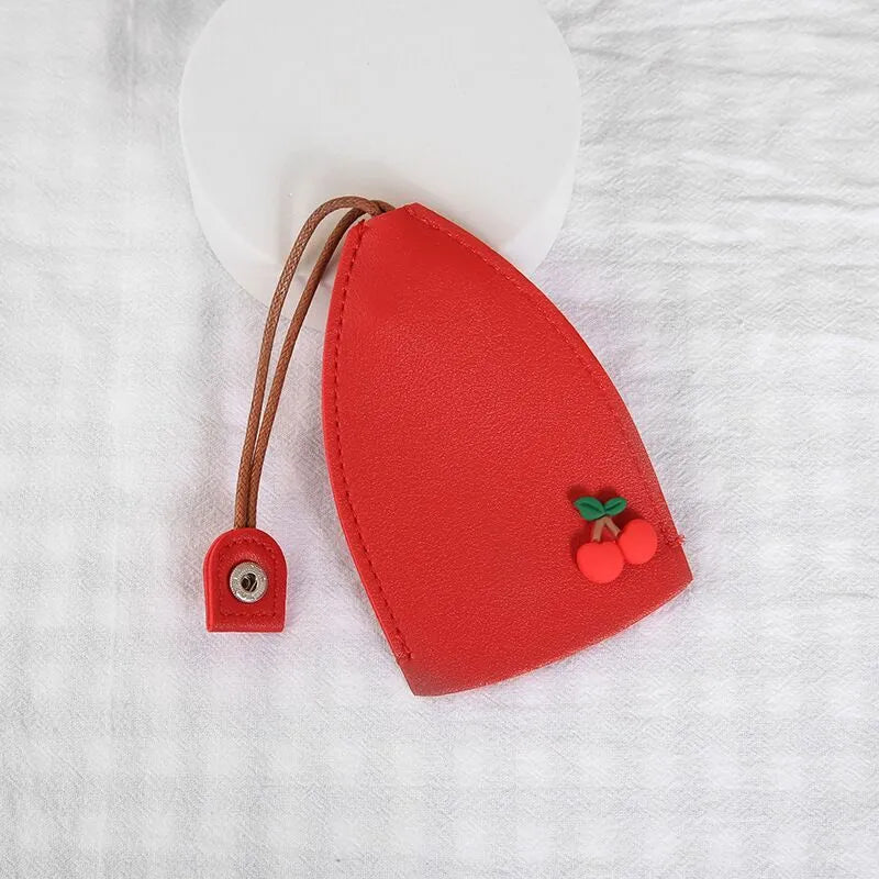 Colourful cartoon pull-out key case made from PU leather showing design options