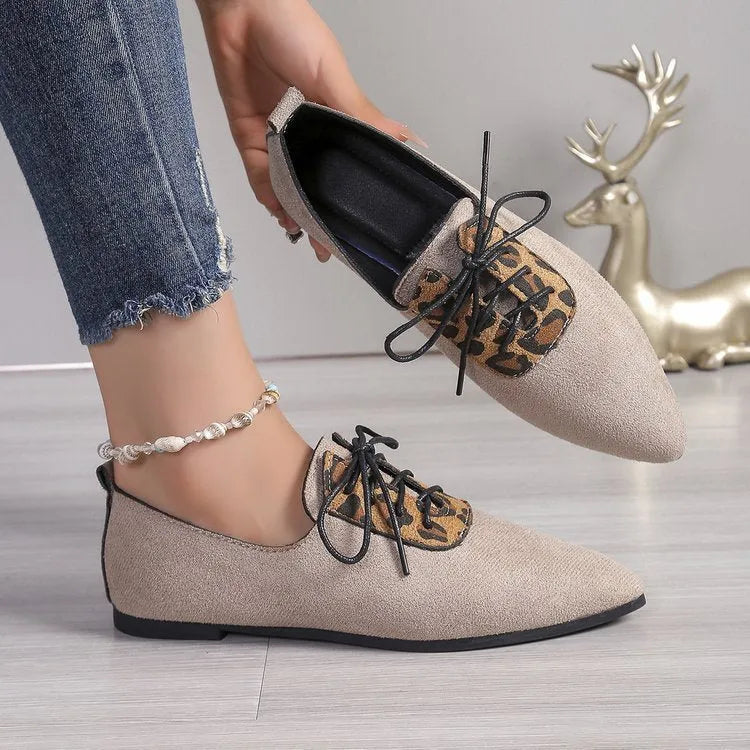 Beige leopard print plus-size women's pumps with pointed toe design on rubber sole