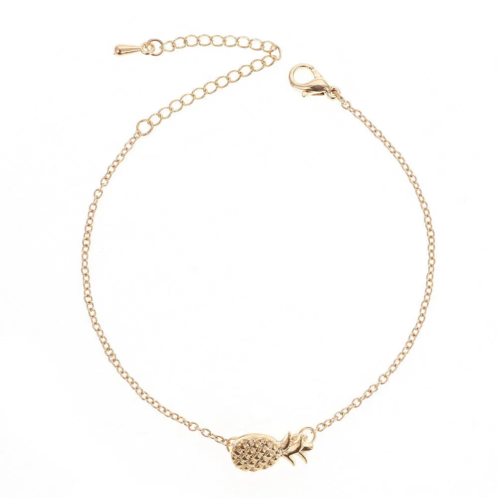 Gold or silver alloy women's bracelet with pineapple charm and adjustable closure