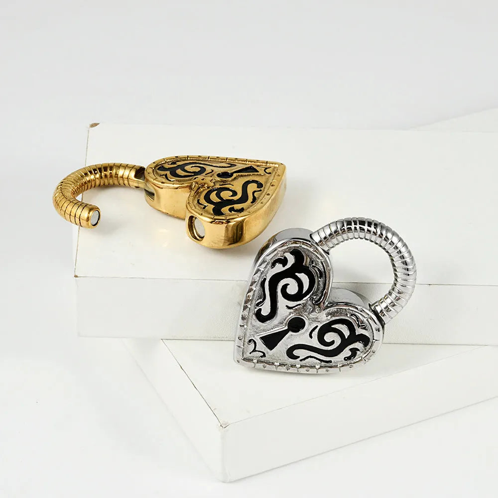 Heart-shaped stainless steel earrings with electroplated gold or steel colour finishes