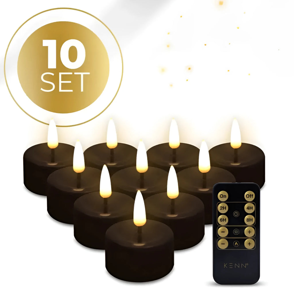 Four black LED tealight candles showing realistic flickering flame effect