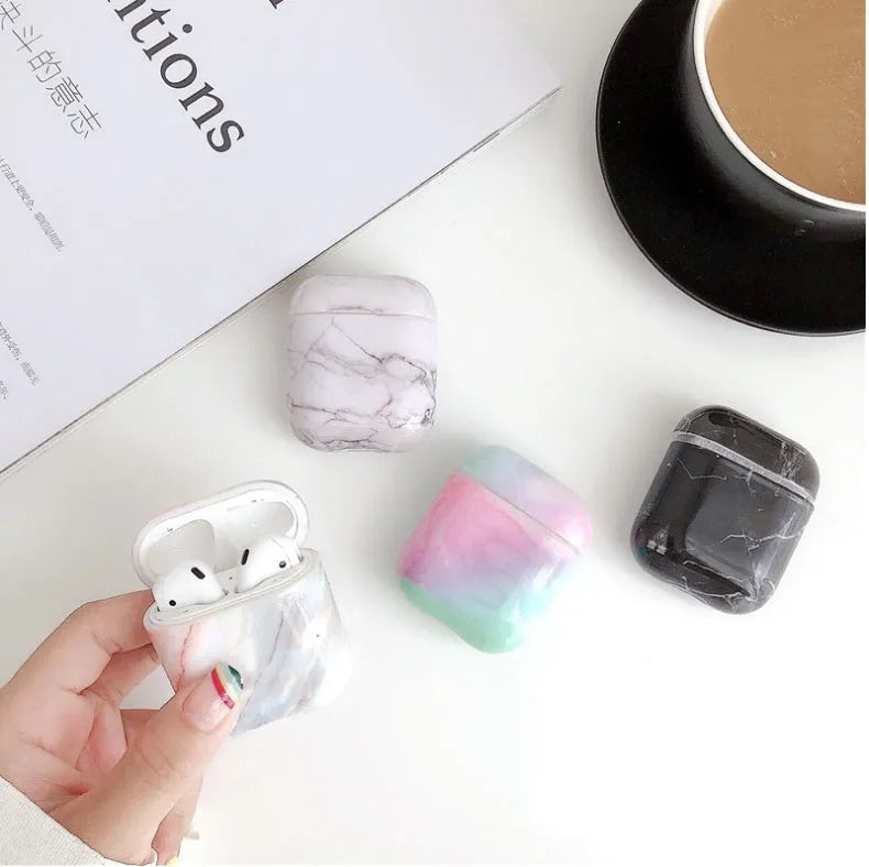 White marble hard PC protective case covering Apple AirPods wireless earphone charging box