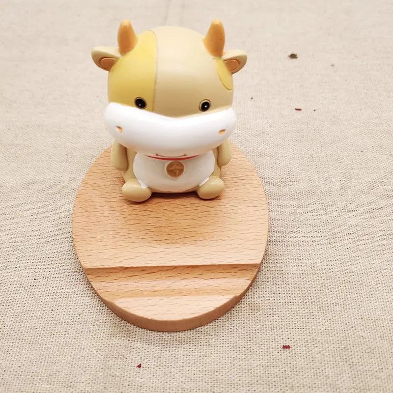 Resin animal-themed mobile phone holder with lazy bracket design for desk organisation