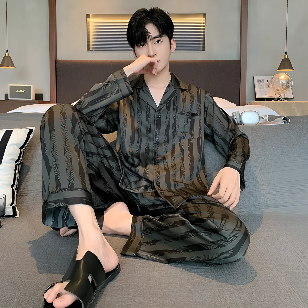 Men's black striped Ice Silk V-neck pyjama set with long sleeves and thin trousers.