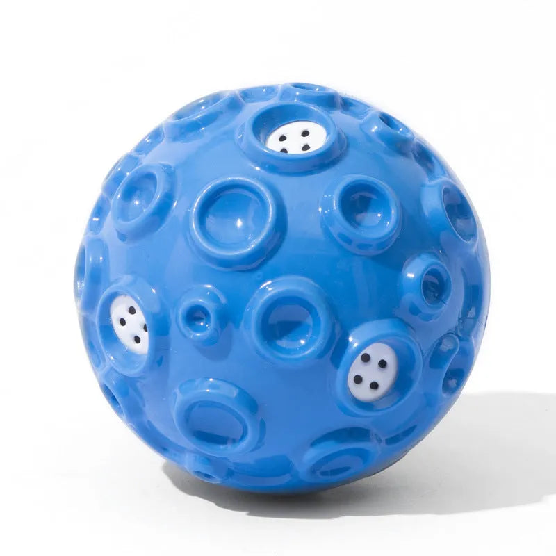 Colourful rubber dog toy ball with textured surface for chewing and teeth cleaning