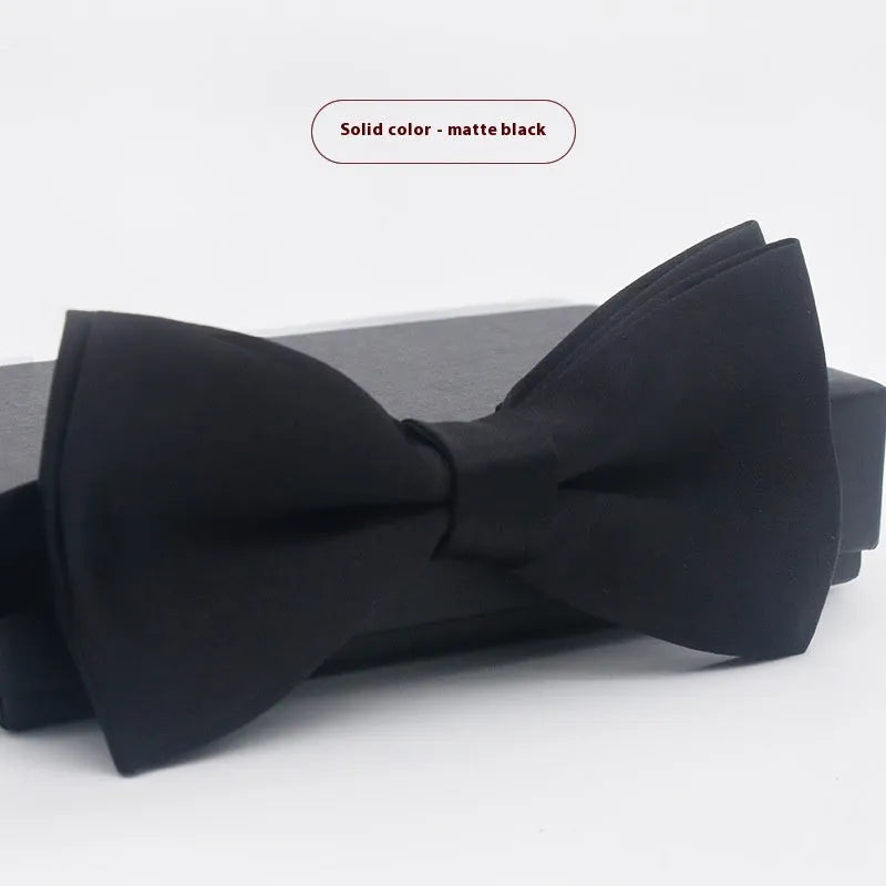 Men's solid colour flat head bow tie in multiple colours including black, white, and wine red.