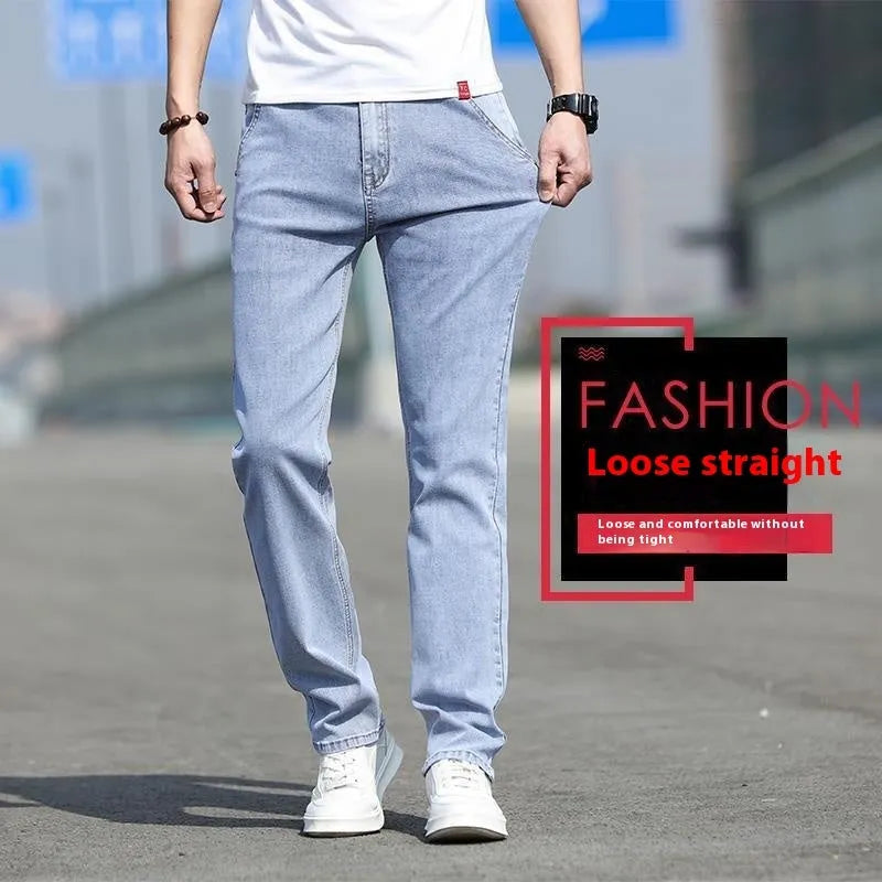 Men's smoky gray straight leg jeans with low waist and zipper fly closure