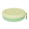Collapsible silicone dog bowl shown in pink and green colour options, compressed and expanded.