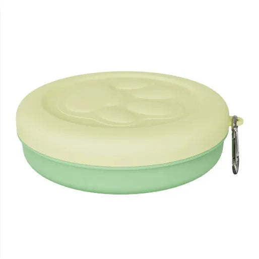 Collapsible silicone dog bowl shown in pink and green colour options, compressed and expanded.
