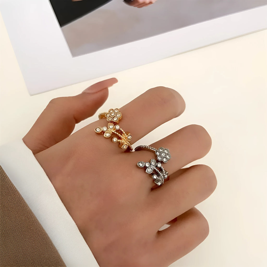 Copper open ring with diamond-treated floral leaf design in gold or white colour.
