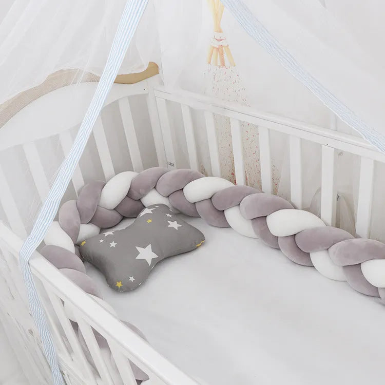 Braided knot cot bumper cushion in spandex velvet for crib safety protection.