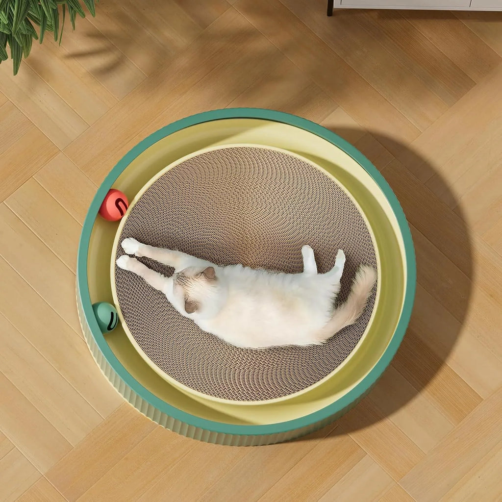 Large circular green and white cat scratching board with bell balls and a refillable cardboard core.