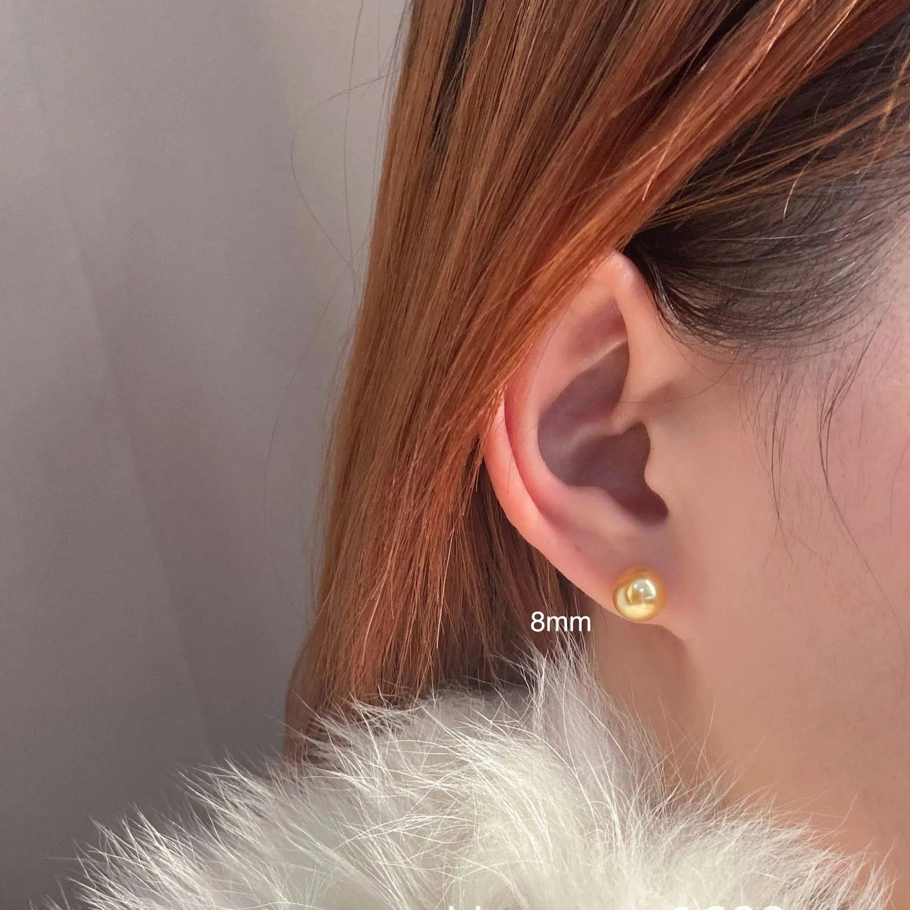 Large retro-style pearl stud earrings for women with a geometric eight-pointed star setting.