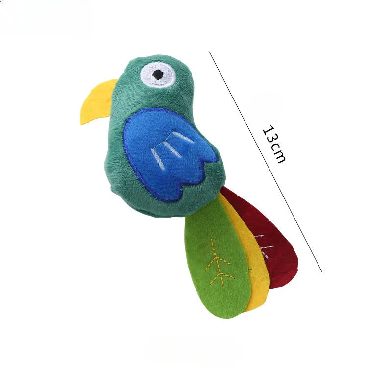 Cow shaped plush cat toy on a string handle with dangling feather, catnip inside.