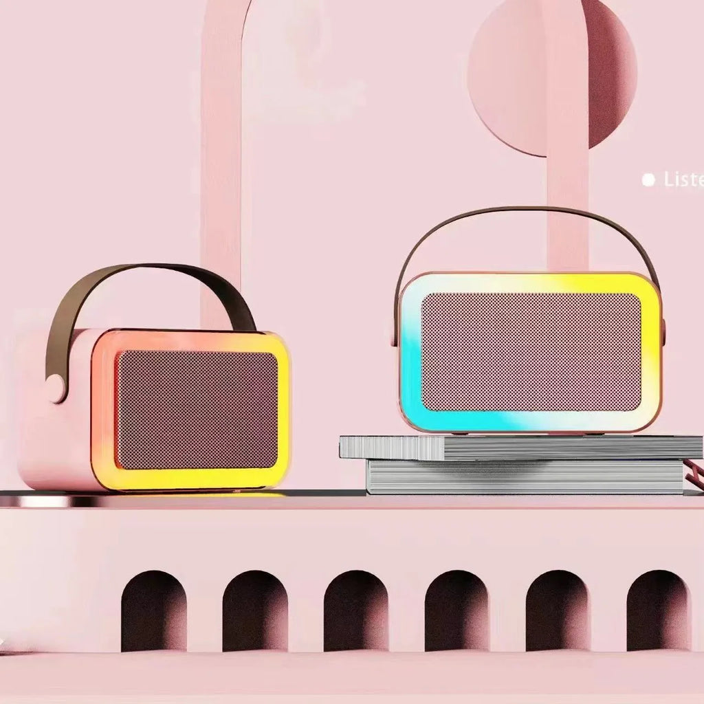 Portable Bluetooth karaoke speaker microphone with coloured lights in pink, sky blue, or white colour options