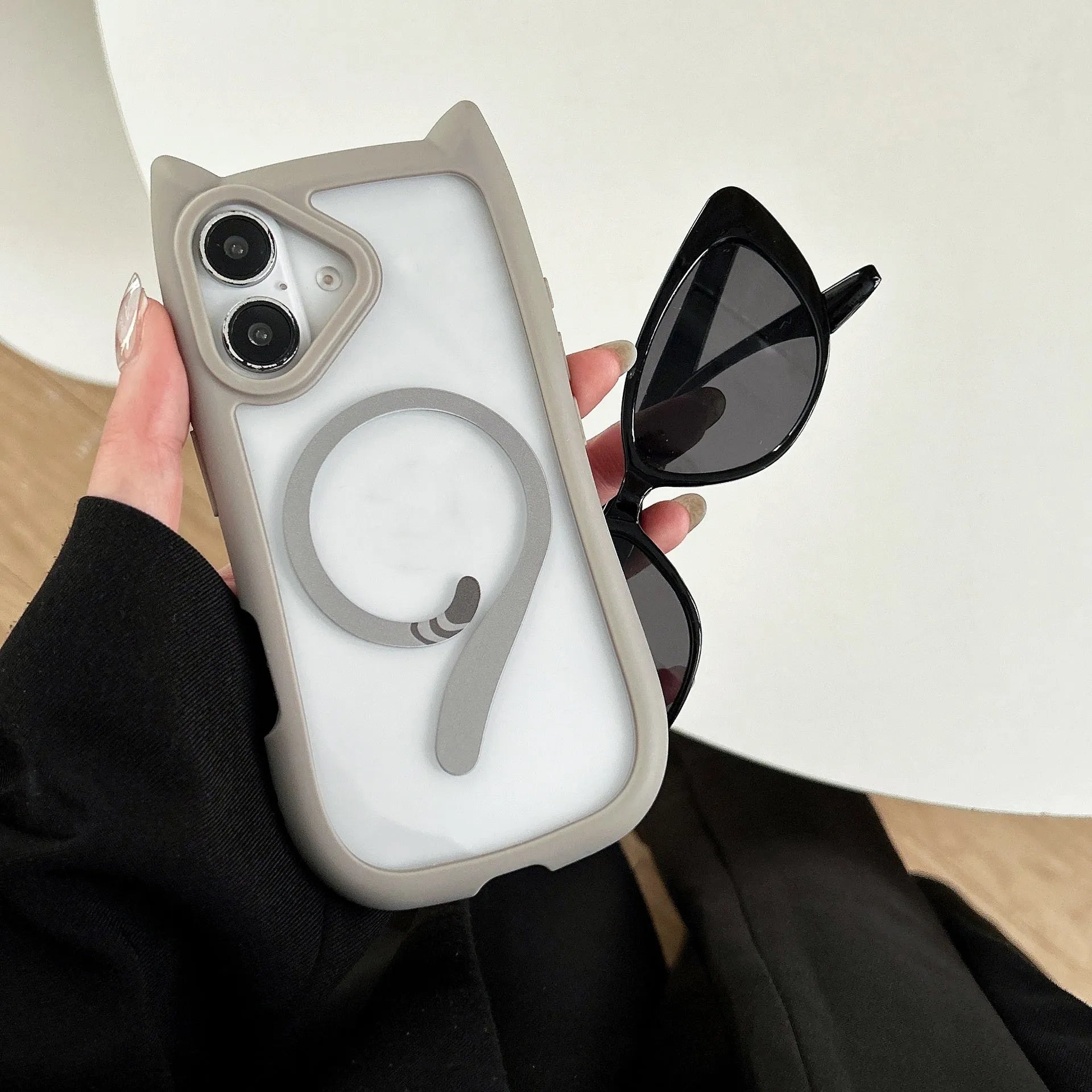 Transparent acrylic TPU phone case for iPhone 17 showing magnetic suction and shockproof design