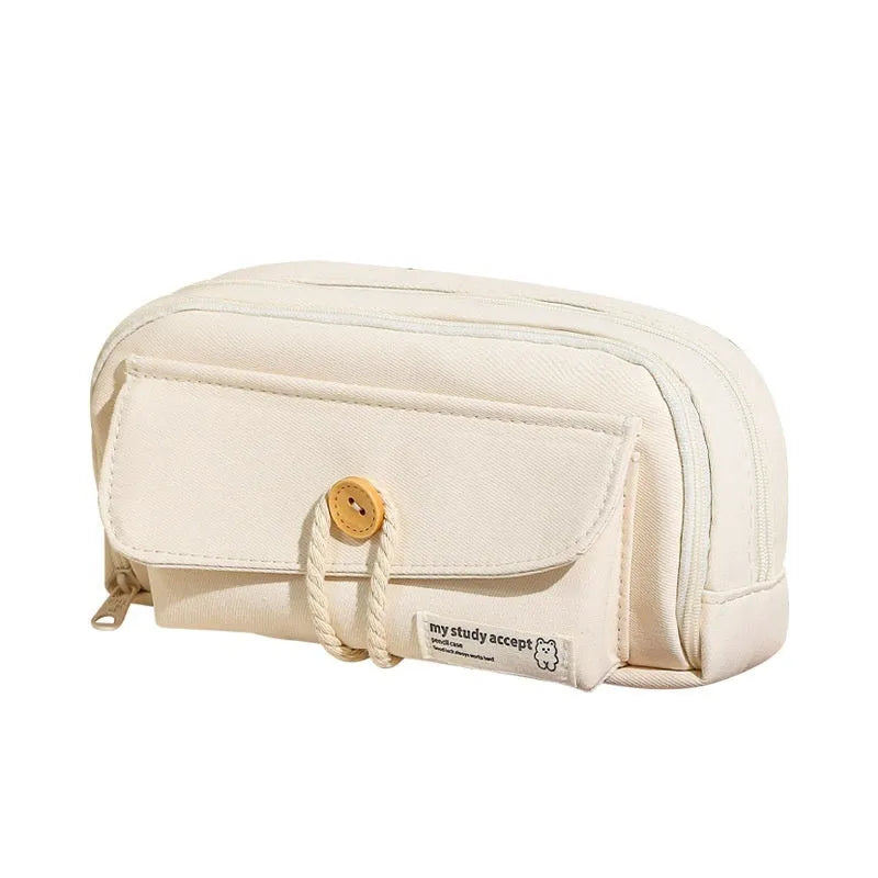 Large capacity Korean-style canvas pencil case for girls in green, holding multiple pens.