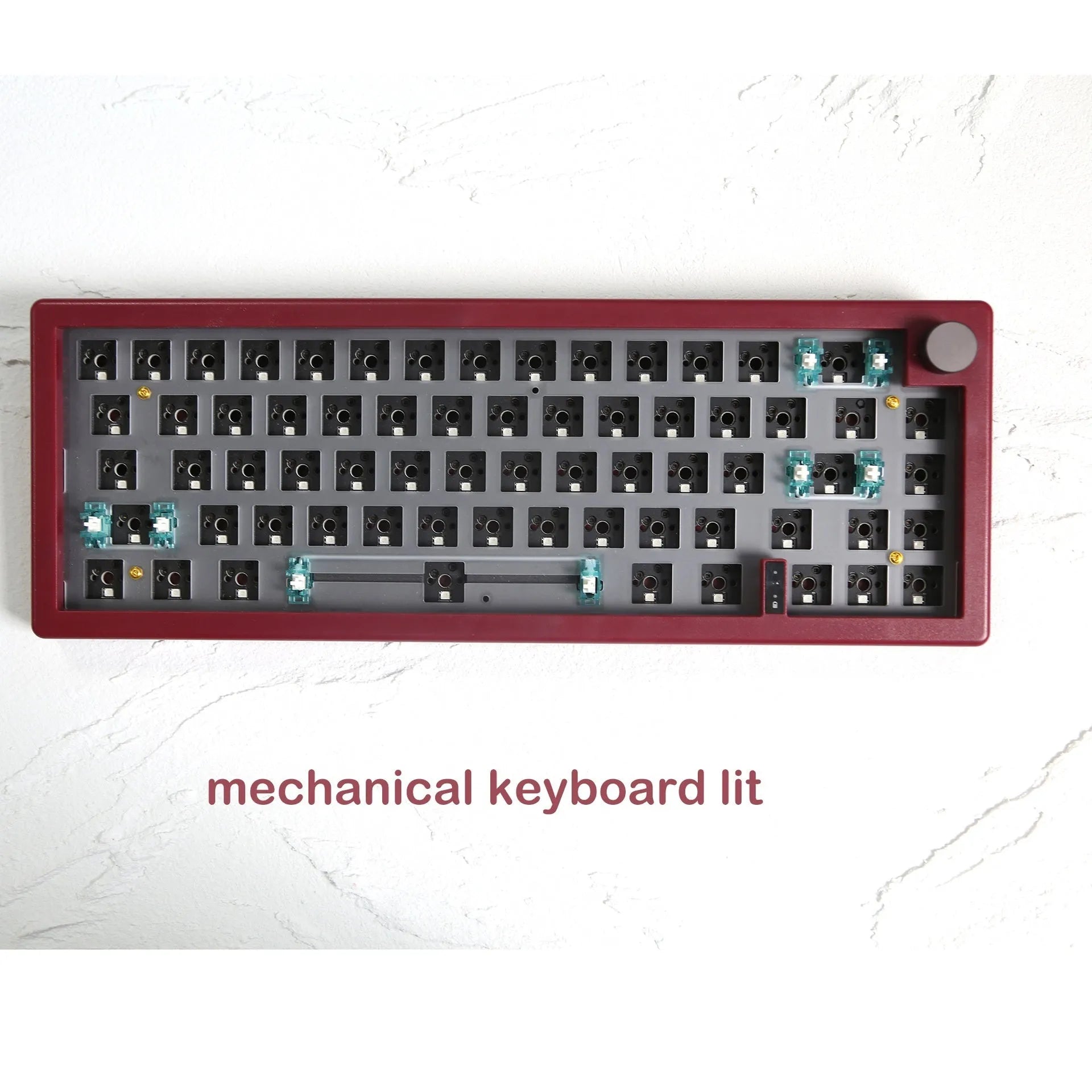 DIY hot-swappable RGB mechanical keyboard kit with ABS chassis, rotary knob, and USB cable in multiple colours.