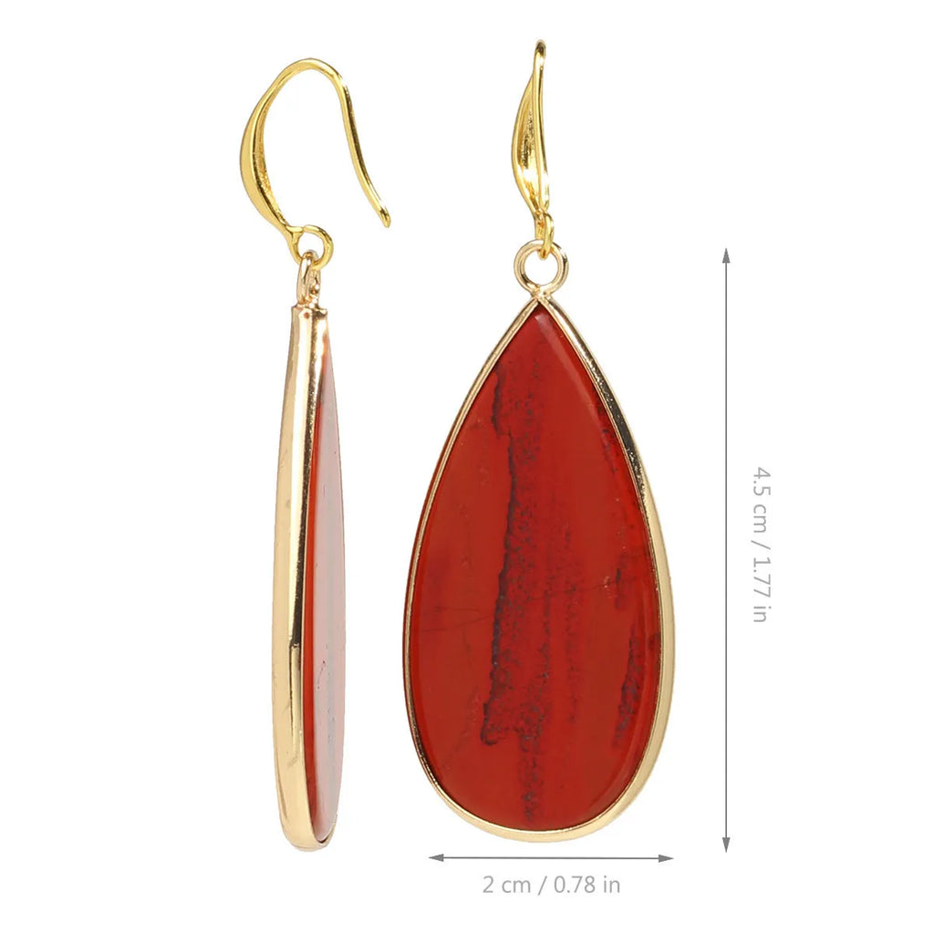 Vintage long drop earrings made from stone with a water droplet texture, shown in Tigereye colour.