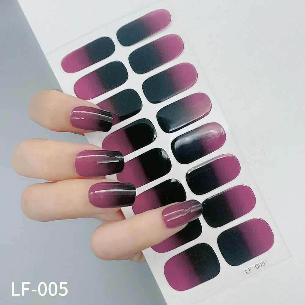 Full coverage nail art stickers sheet with 16 designs including cross, rose, tulip, and cartoon patterns.