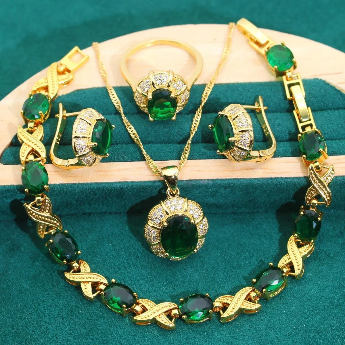 18k gold plated jewellery set with ring, earrings, bracelet and necklace featuring coloured zircon stones.