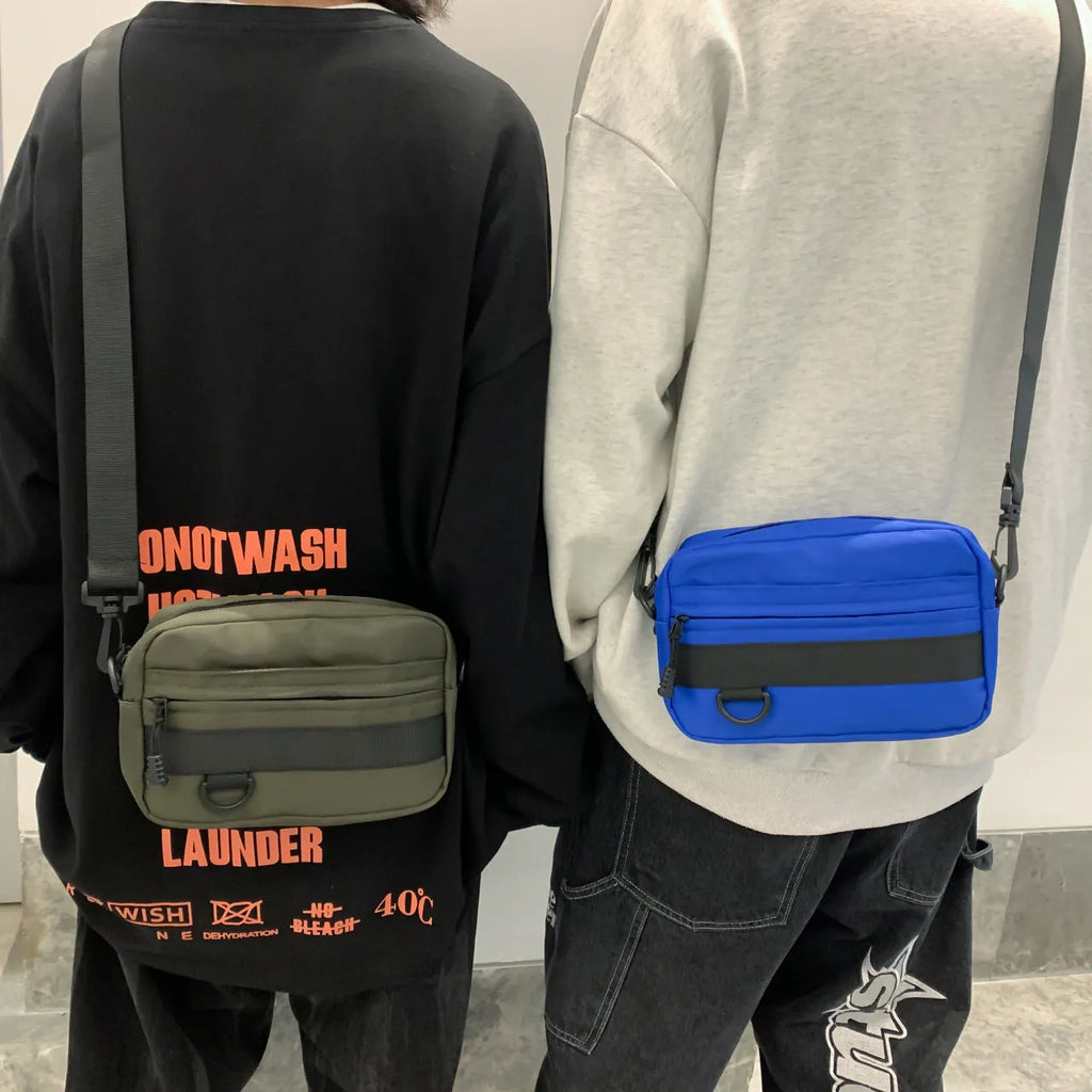 Men's street style nylon messenger bag showing dimensions of 22cm length × 14cm height × 5cm width