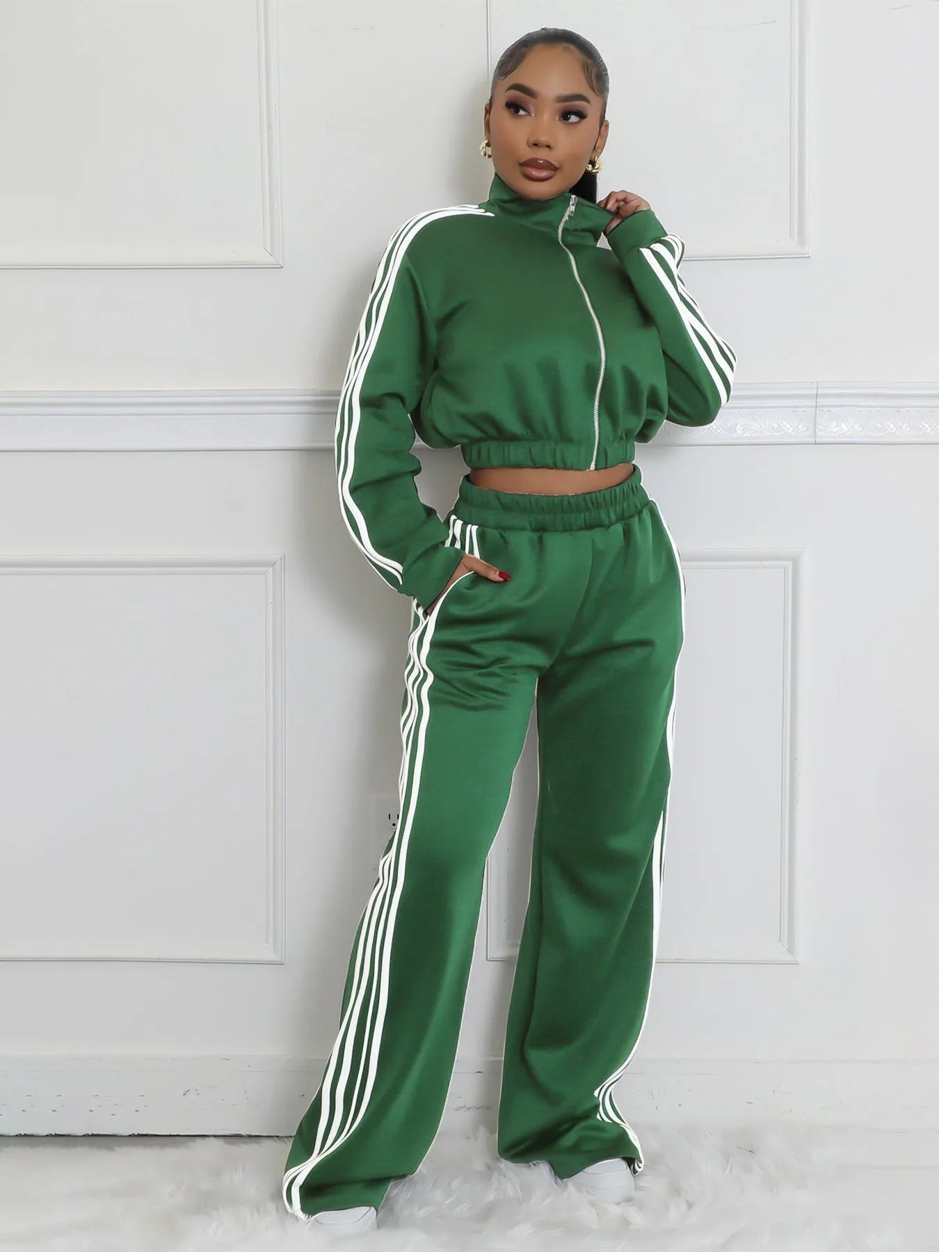 Grey striped sweater with zipper and matching trousers, a street hipster two-piece set.