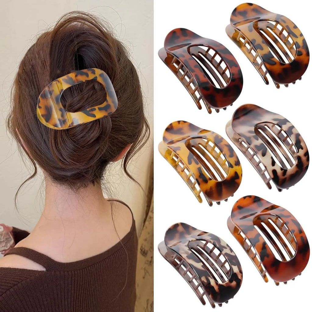 Six rose red plastic hair clips with quadrilateral shape and frosted grip, presented in an OPP bag.