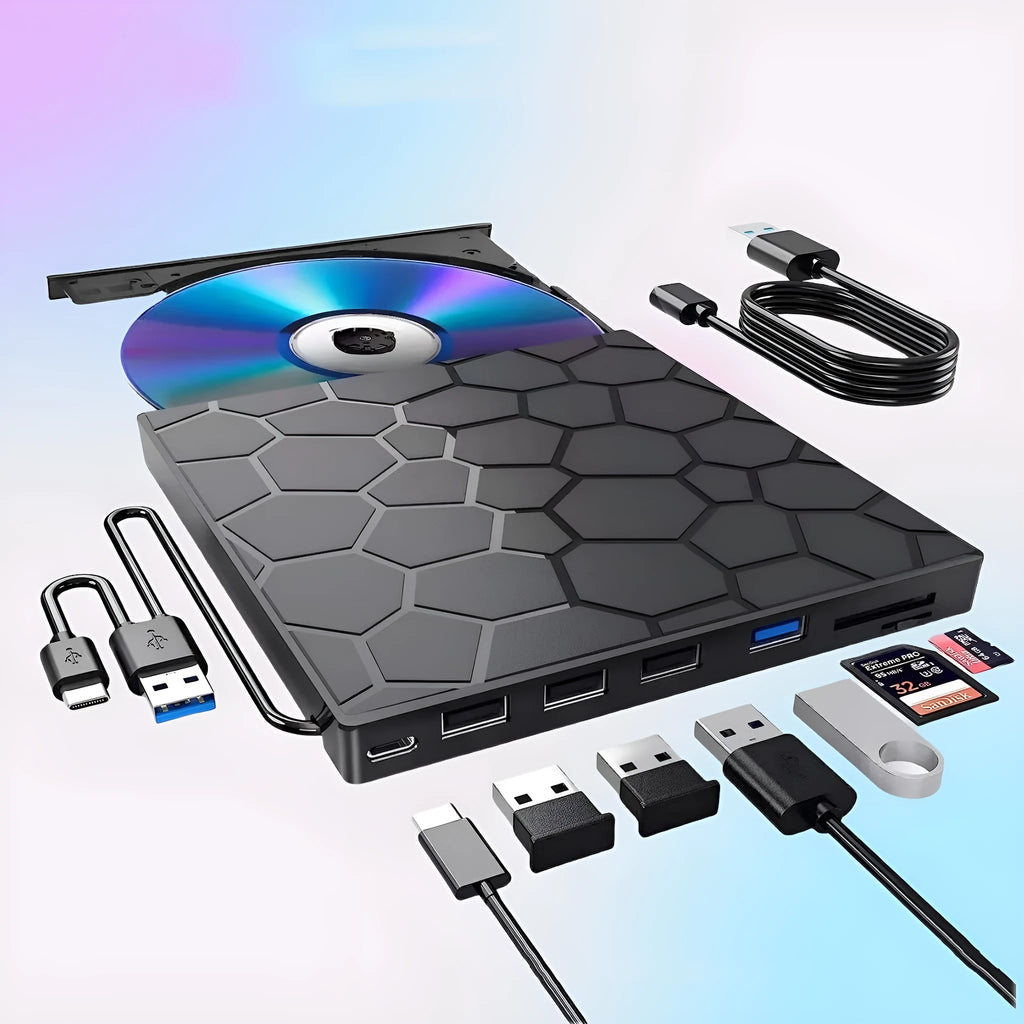 Black external USB CD/DVD burner drive on a desk next to a laptop