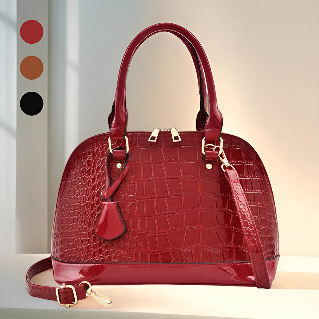 Large shiny PU leather crossbody bag in shell shape design on adjustable strap