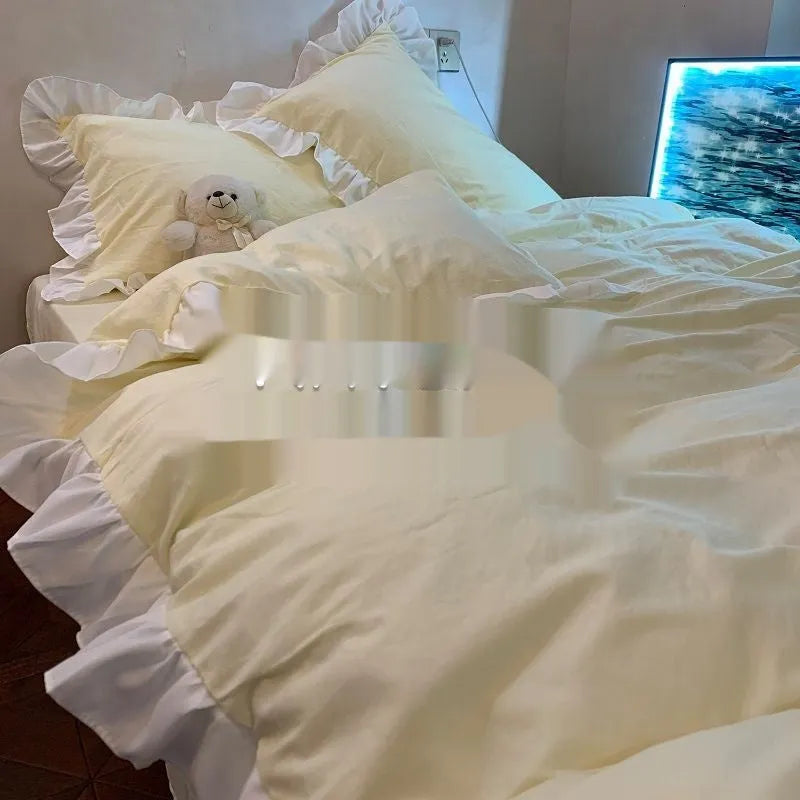 Washed cotton four-piece bedding set in Mori style showing lace-trimmed solid colour options