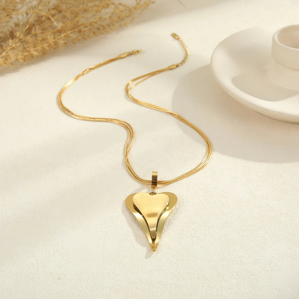 Double heart snake bones geometric necklace in gold and steel stainless steel finishes