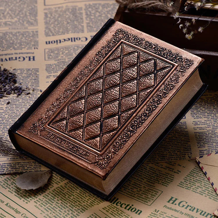 Embossed faux leather notepad showing three-dimensional cover design in bronze and black gold colour options