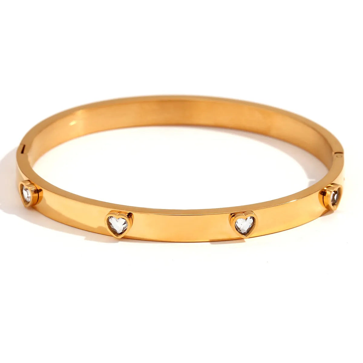 Stainless steel women's bracelet with peach heart design and micro-inlaid detailing in electroplated golden colour