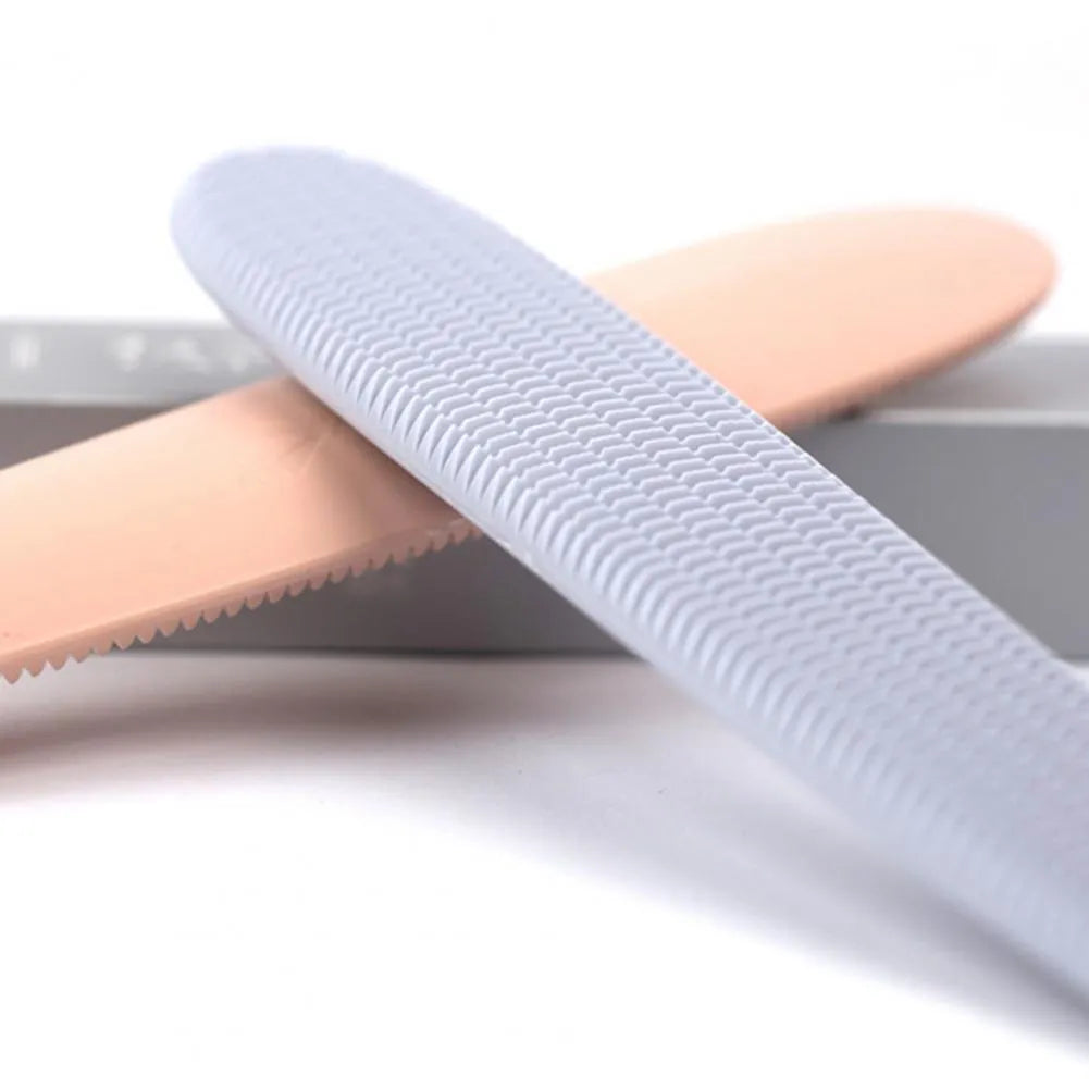 Grey and pink cat grooming combs with tongue massager design and dual ends