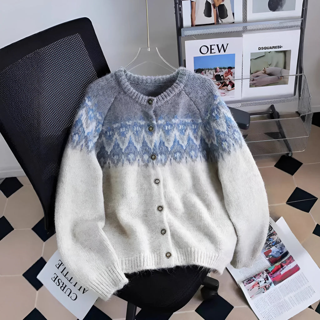 Women's loose-fit jacquard knit sweater coat in milky white, shown with long sleeves and textured pattern.
