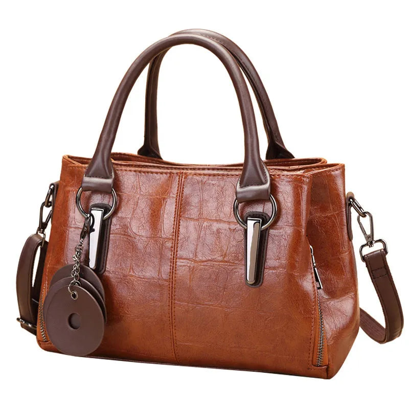 Horizontal square PU shoulder bag with open pocket and contrast stitching in black or brown colour options