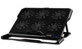Black metal mesh laptop cooling board with a fan, placed under a notebook on a desk.