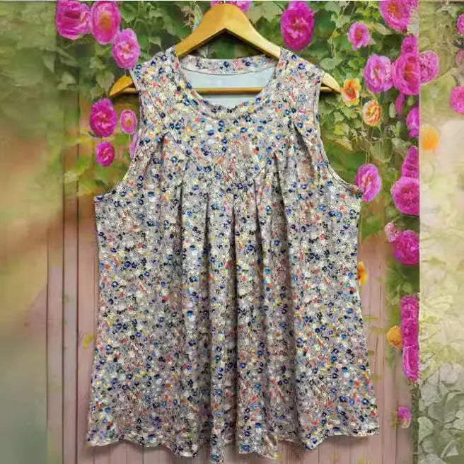Black plus size floral printed sleeveless vest with round neckline on hanger