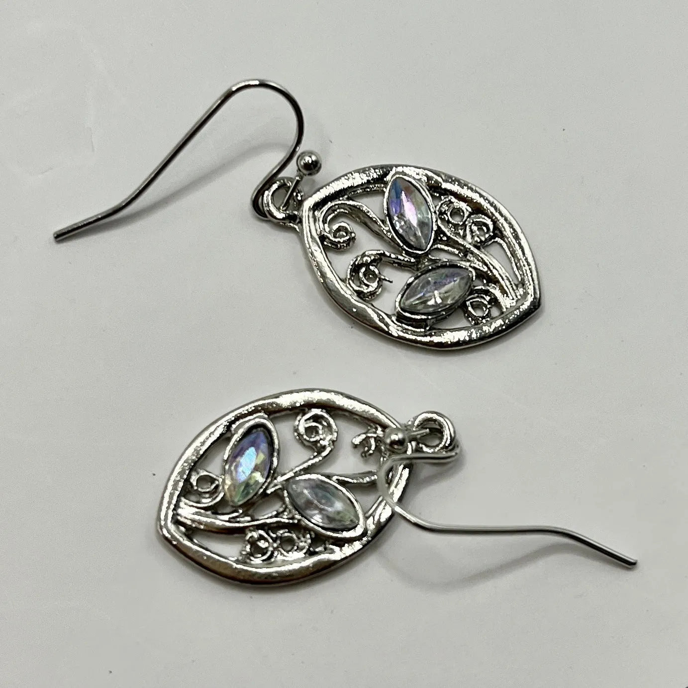 Silver colour leaves embedded colourful moonstone earrings for women with alloy construction