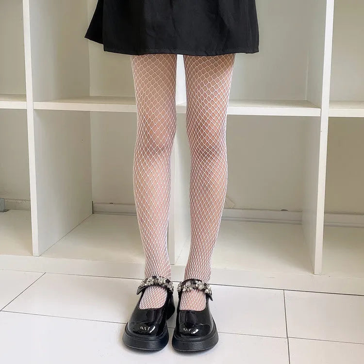 Women's summer mesh stockings showing large, medium and small net patterns in black and white colours