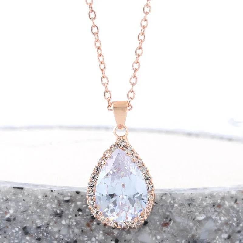 Water drop rose gold rhinestone geometric necklace pendant in pink colour with alloy construction
