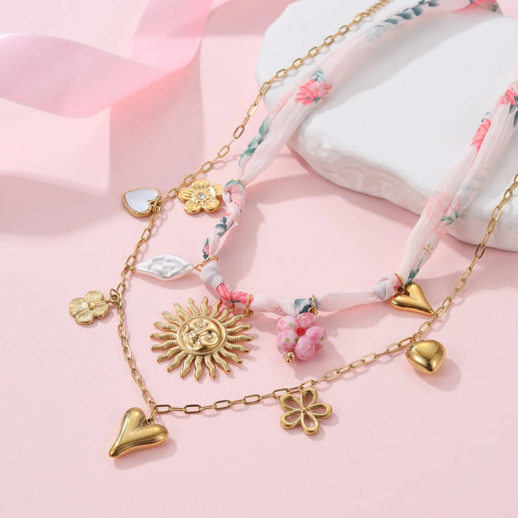 Stainless steel necklace with geometric sun pendant on adjustable 41-50 cm chain, electroplated 18K gold finish