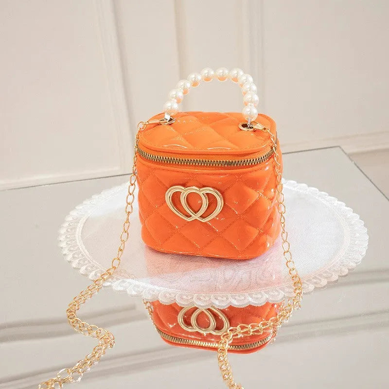 PVC bucket-style gel bag with heart pattern in apricot colour, suitable for cosmetic and toiletry storage