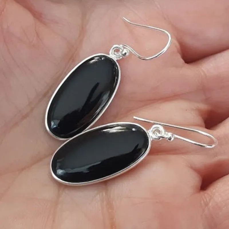 Women's geometric earrings with oval black agate pendants and Chinese style design on silver electroplated alloy